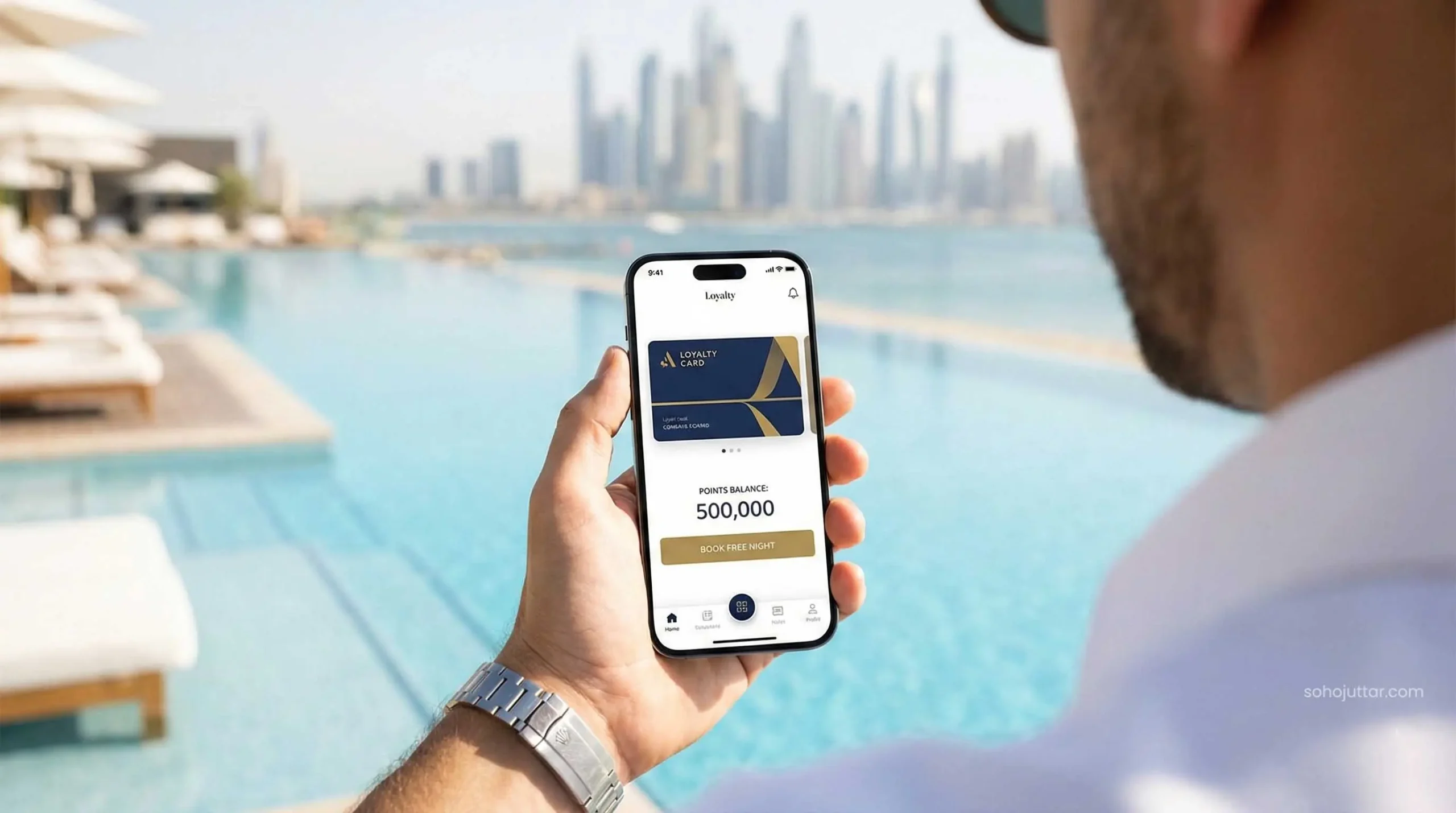 Checking hotel reward points balance on a smartphone app in Dubai.